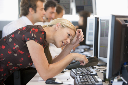 Woman Looking At Monitor Frustrated